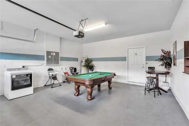 playroom featuring a garage, washer / dryer, billiards, electric panel, and concrete flooring