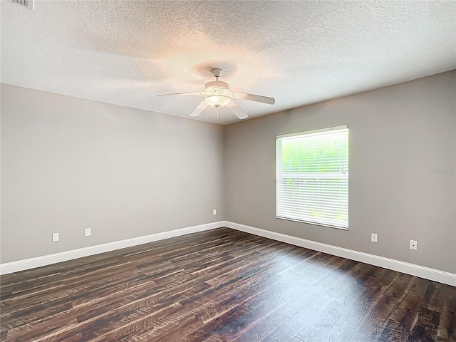 spare room featuring a textured ceiling, hardwood / wood-style floors, and ceiling fan