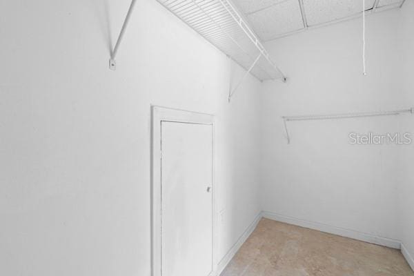 spacious closet with attic access