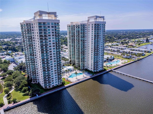 birds eye view of property with a water view