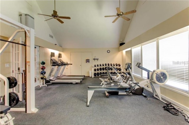 workout area featuring ceiling fan, carpet flooring, and high vaulted ceiling