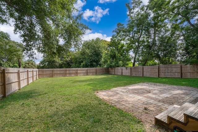 view of yard with a patio area