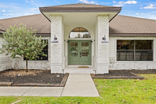 property entrance featuring french doors