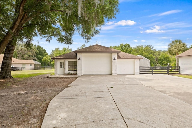 view of front of property featuring a garage