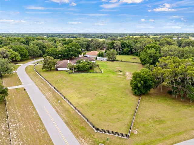 birds eye view of property with a rural view