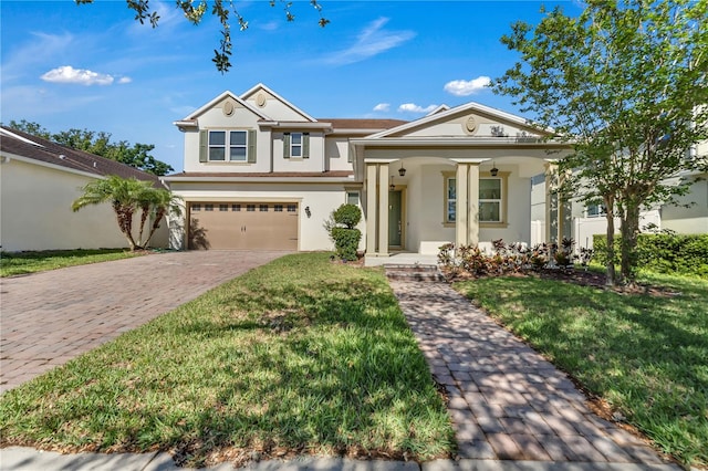 view of front facade featuring a garage and a front yard