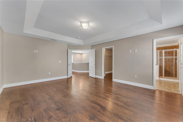 interior space with a tray ceiling