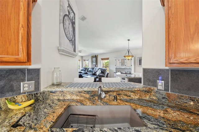 kitchen with sink and decorative backsplash