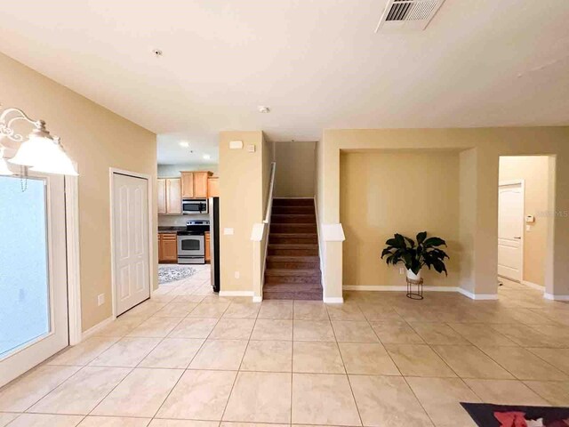 interior space with tile patterned flooring