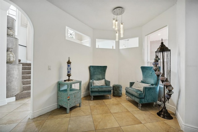 living area featuring light tile patterned flooring