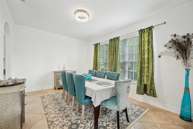 dining room featuring light tile patterned flooring