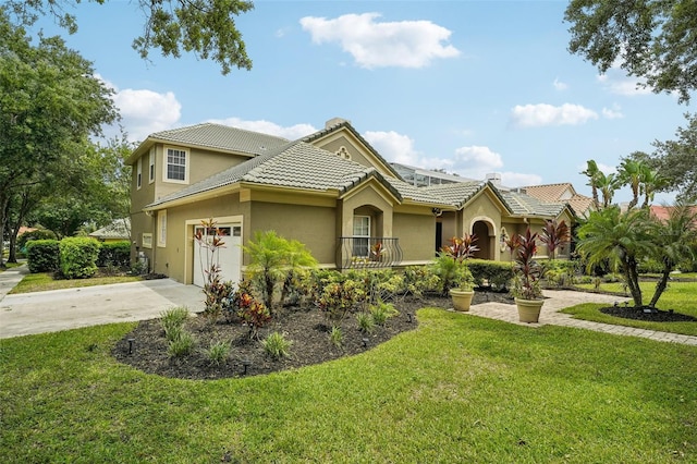 view of front facade with a garage and a front yard