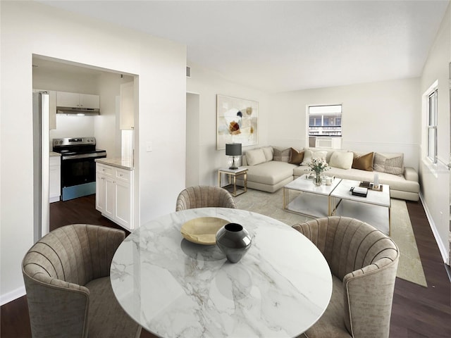 dining space with dark hardwood / wood-style flooring