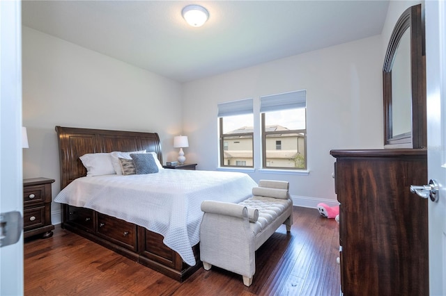 bedroom featuring dark wood-type flooring