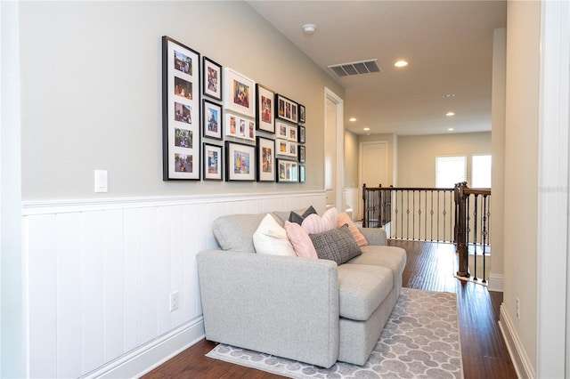 living area with dark hardwood / wood-style flooring