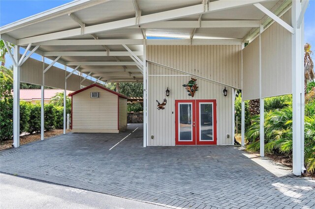 view of parking / parking lot with a carport