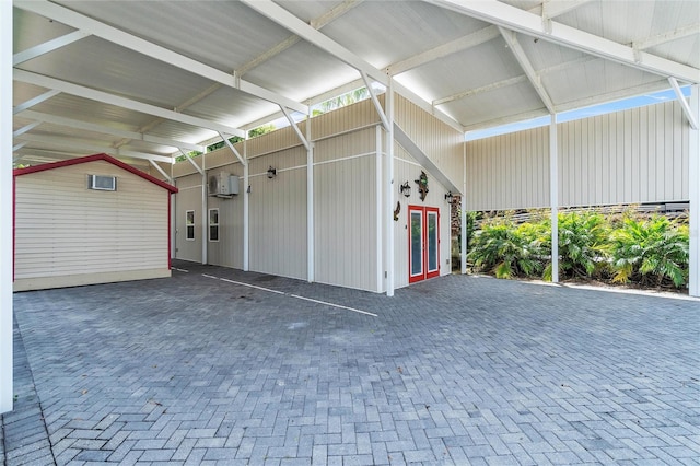 garage featuring a carport