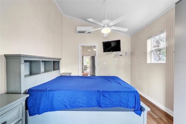 bedroom with hardwood / wood-style flooring, multiple windows, ornamental molding, and ceiling fan