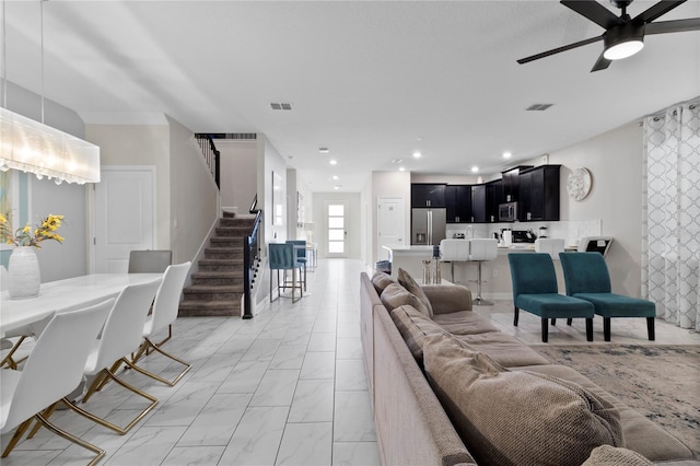 living room with ceiling fan