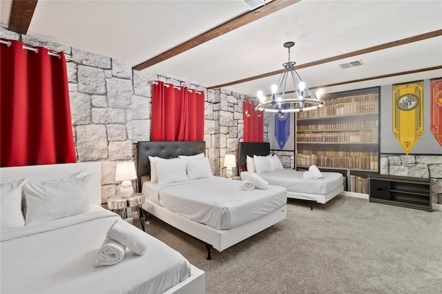 bedroom with beam ceiling, a textured ceiling, a chandelier, and carpet flooring