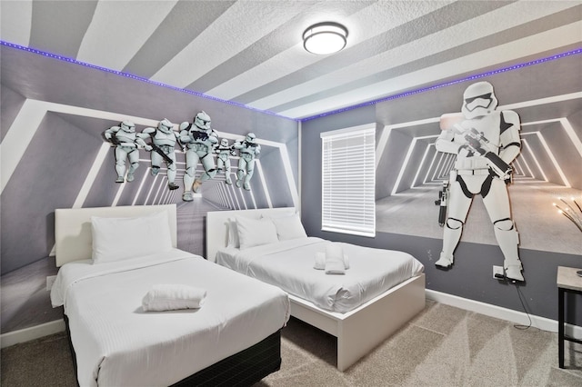 carpeted bedroom featuring a textured ceiling