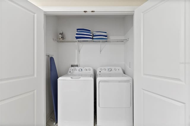 laundry room with washer and dryer