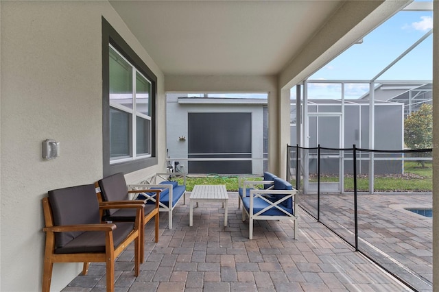 sunroom / solarium featuring a healthy amount of sunlight