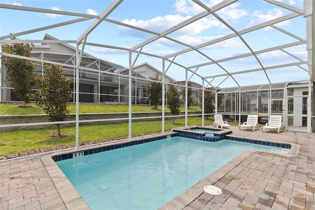 view of pool with an in ground hot tub, a patio, glass enclosure, and a lawn