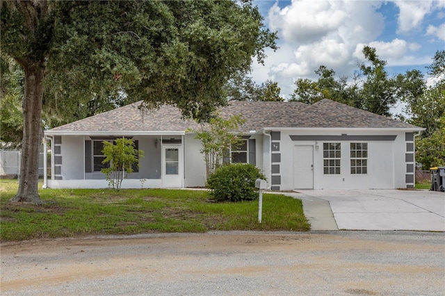 single story home with a garage