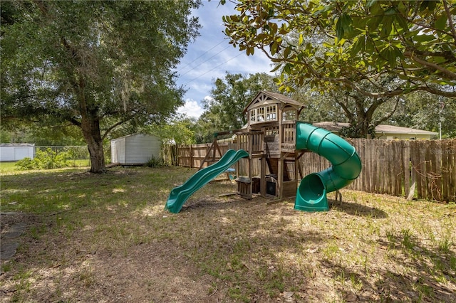 view of playground featuring a storage unit