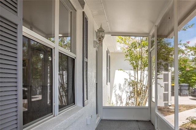 unfurnished sunroom with plenty of natural light