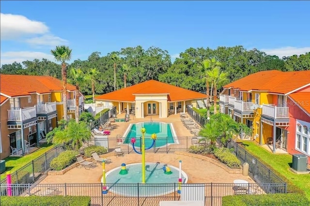 view of pool with a patio and central AC