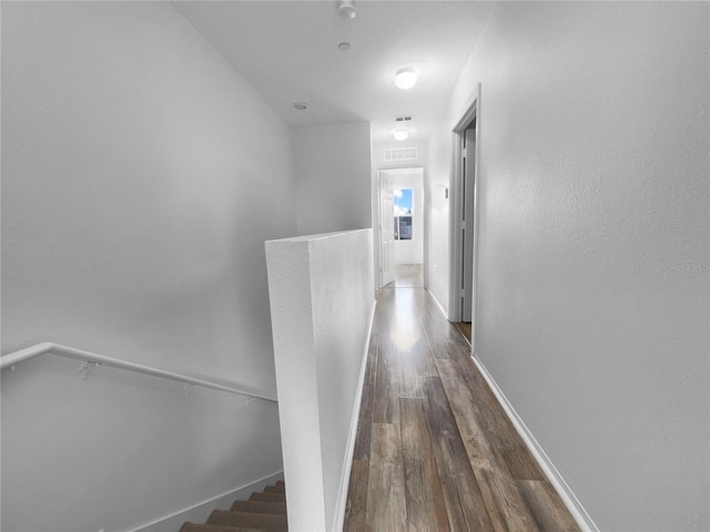 hall featuring dark wood-type flooring