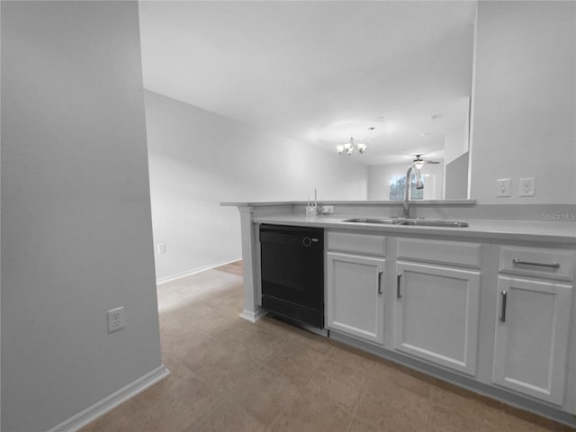 kitchen featuring sink, white cabinetry, a chandelier, black dishwasher, and kitchen peninsula