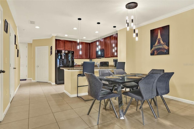 tiled dining room with crown molding