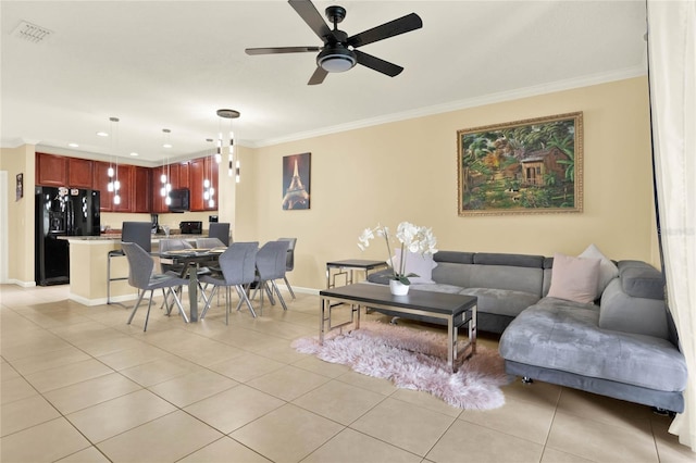 tiled living room featuring ornamental molding and ceiling fan