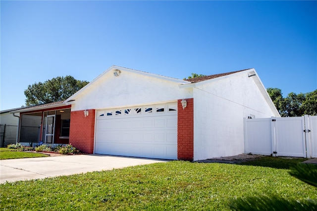 ranch-style house with a front yard and a garage