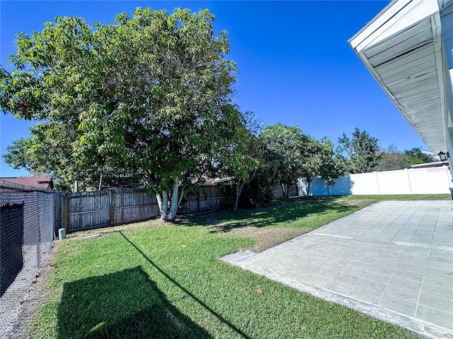 view of yard with a patio area