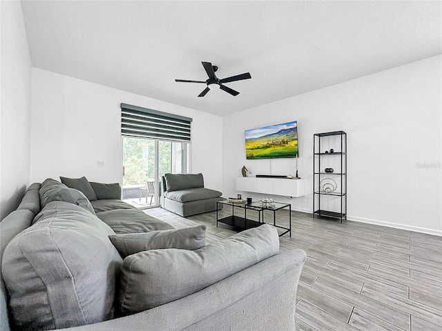 living room with ceiling fan