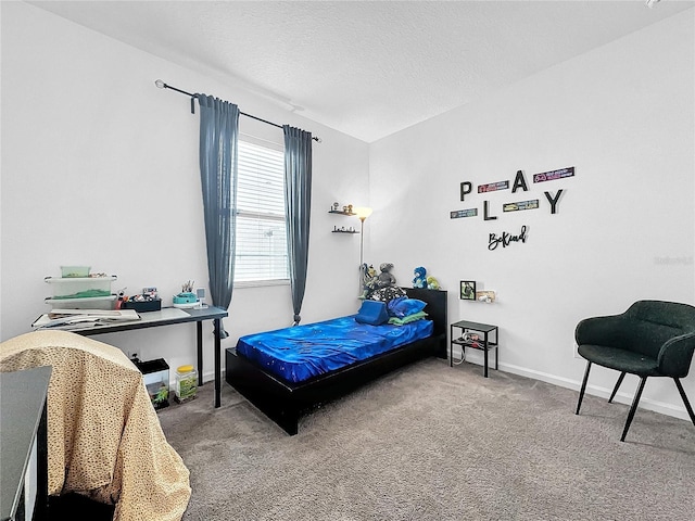 bedroom with a textured ceiling, carpet, and lofted ceiling