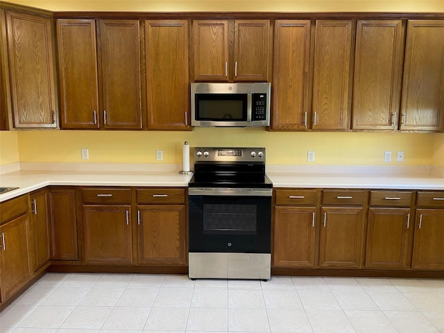 kitchen with appliances with stainless steel finishes