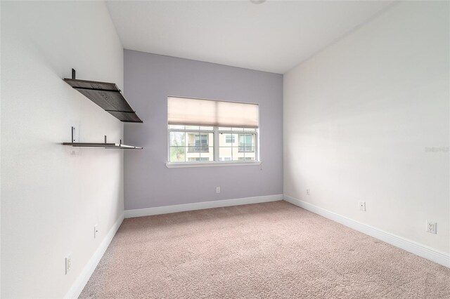 spare room with carpet flooring