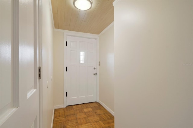 doorway featuring light parquet floors and crown molding