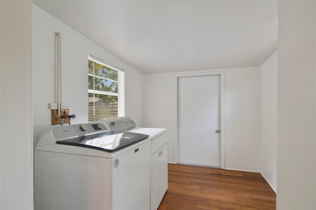 washroom featuring independent washer and dryer and hardwood / wood-style floors