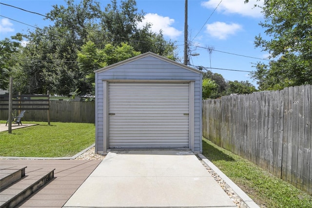 garage with a lawn