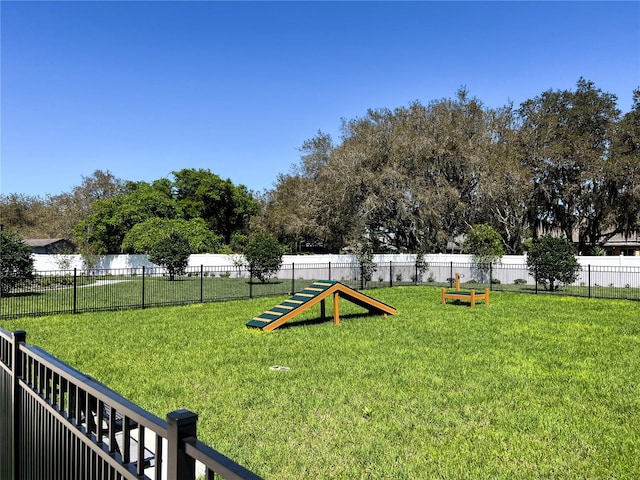 view of community featuring a yard