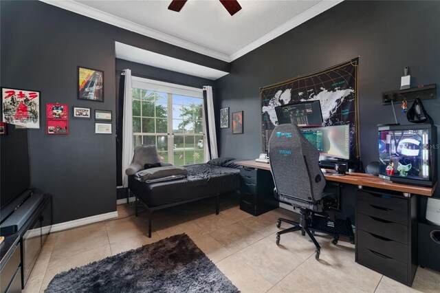 tiled home office with ceiling fan and crown molding