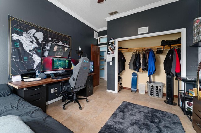 office area featuring light tile patterned floors and ornamental molding