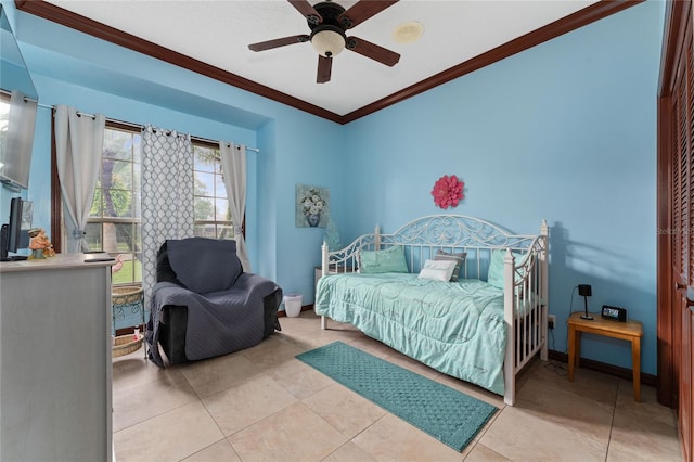 bedroom with ceiling fan, light tile patterned floors, and crown molding