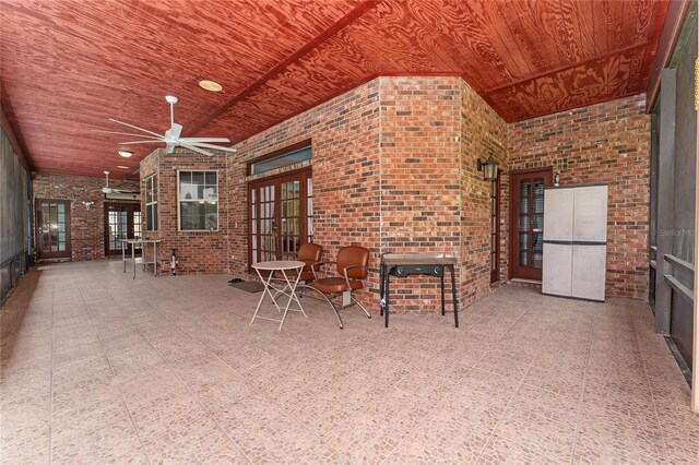 view of patio featuring ceiling fan and french doors